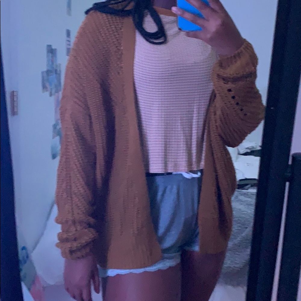 yellow cardigan